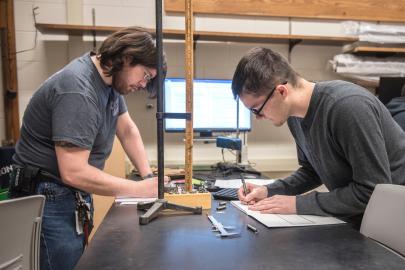 Students working in a physics lab.
