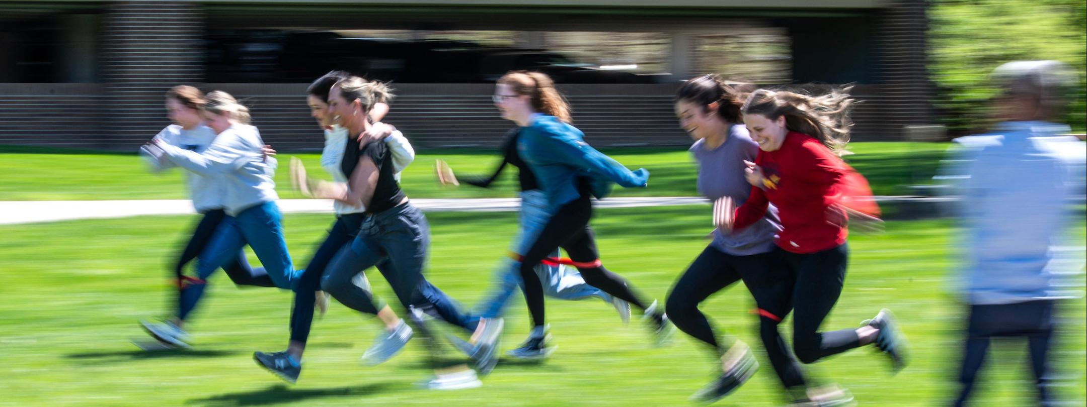 Students are running across the Science Mall